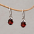 Garnet dangle earrings, 'Caressed by Paws' - Paw Print Faceted Garnet Dangle Earrings from Bali thumbail