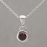 Garnet pendant necklace, 'Glowing Paws' - Garnet and Sterling Silver Pendant Necklace from Bali