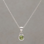 Peridot pendant necklace, 'Glowing Paws' - Peridot and Sterling Silver Pendant Necklace from Bali