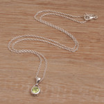Peridot pendant necklace, 'Glowing Paws' - Peridot and Sterling Silver Pendant Necklace from Bali