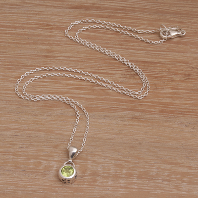 Peridot pendant necklace, 'Glowing Paws' - Peridot and Sterling Silver Pendant Necklace from Bali