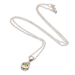 Peridot pendant necklace, 'Glowing Paws' - Peridot and Sterling Silver Pendant Necklace from Bali