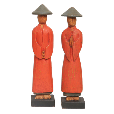 Wood statuettes, 'Neighborly Couple' (pair) - Hand Carved Red Robed Wood Farmer Statuettes (Pair)