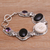 Onyx and amethyst link bracelet, 'Midnight Duo' - Handcrafted Sterling Silver Onyx Amethyst Bone Bracelet (image 2b) thumbail