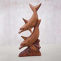 Wood sculpture, 'Wandering Dolphins' - Dolphin-Themed Suar Wood Sculpture from Indonesia