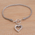 Sterling silver charm bracelet, 'Love Is Complex' - Sterling Silver Heart Charm Bracelet Crafted in Bali thumbail