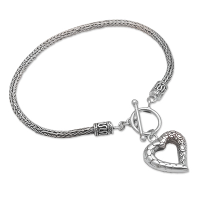 Sterling silver charm bracelet, 'Love Is Complex' - Sterling Silver Heart Charm Bracelet Crafted in Bali
