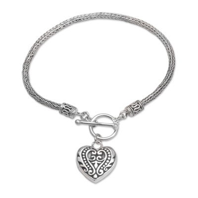 Sterling silver charm bracelet, 'Love Is Endless' - Sterling Silver Bracelet with Heart Charm Crafted in Bali