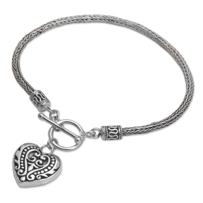 Sterling silver charm bracelet, 'Love Is Endless' - Sterling Silver Bracelet with Heart Charm Crafted in Bali