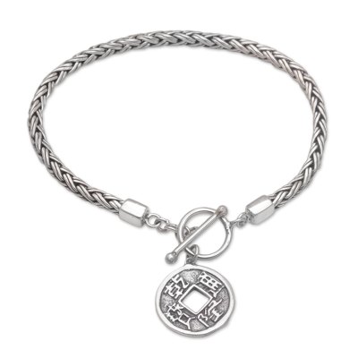 Sterling silver charm bracelet, 'Pis Bolong Coin' - Sterling Silver Coin Charm Bracelet Crafted in Bali