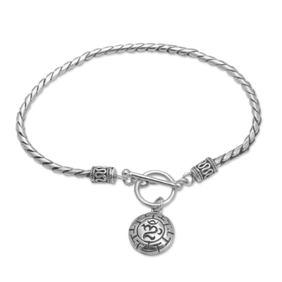 Sterling silver charm bracelet, 'Temesir Omkara' - Sterling Silver Om Charm Bracelet Crafted in Bali