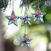 Wood ornaments, 'Birds of the Islands' (set of 4) - Hand Painted Balinese Star Ornaments (Set of 4)