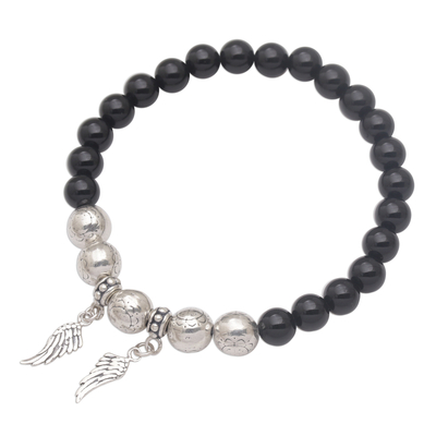 Onyx beaded stretch charm bracelet, 'Twilight Flight' - Onyx Beaded Stretch Bracelet with Sterling Silver Wings