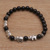 Onyx beaded stretch bracelet, 'Elephant Cavalcade in Black' - Sterling Silver and Onyx Beaded Stretch Bracelet from Bali