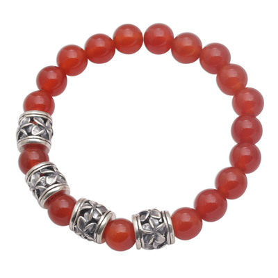 Carnelian beaded stretch bracelet, 'Jepun Sunset' - Carnelian Beaded Stretch Bracelet with Sterling Silver Beads