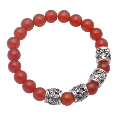 Carnelian beaded stretch bracelet, 'Jepun Sunset' - Carnelian Beaded Stretch Bracelet with Sterling Silver Beads