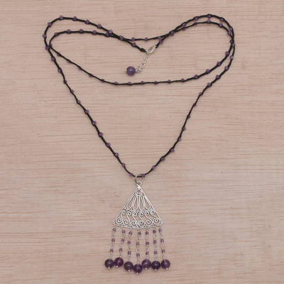 Amethyst pendant necklace, 'Rise and Fall in Black' - Amethyst and Black Cord Pendant Necklace Handmade in Bali