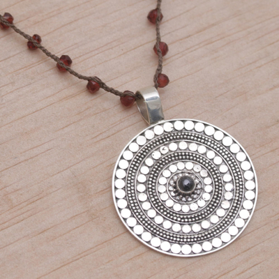 Garnet and onyx pendant cord necklace, 'Shining Shield in Red' - Handmade 925 Sterling Silver Garnet Cord Pendant Necklace