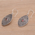 Garnet dangle earrings, 'Shield of Daisies' - Garnet and Sterling Silver Floral Motif Dangle Earrings