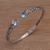Blue topaz cuff bracelet, 'Entangled' - Blue Topaz Sterling Silver Delicate Cuff Bracelet (image 2) thumbail