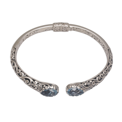 Blue topaz cuff bracelet, 'Entangled' - Blue Topaz Sterling Silver Delicate Cuff Bracelet