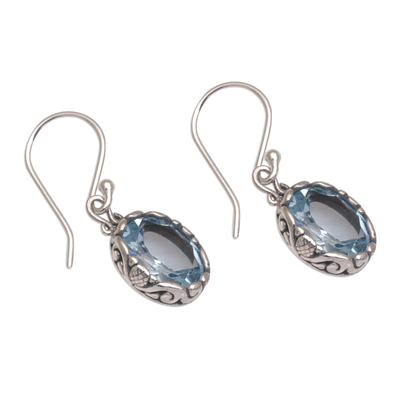 Blue topaz dangle earrings, 'Temptation Oval' - Blue Topaz Oval Faceted Dangle Earrings