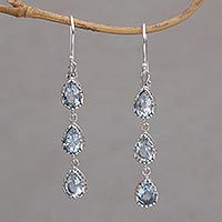 Blue topaz dangle earrings, 'Eternity Drop' - Blue Topaz and Sterling Silver Dangle Earrings from Bali