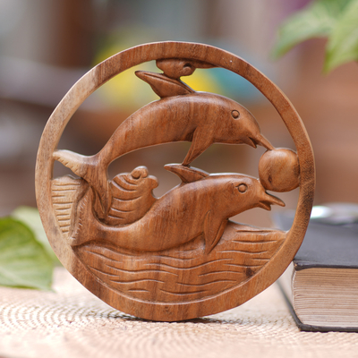 Wood relief panel, 'Fun with Dolphins' - Hand Carved Suar Wood Dolphin Relief Panel from Bali