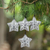 Recycled newspaper ornaments, 'New Life Stars' (set of 4) - Recycled Newspaper Star-Shaped Holiday Ornaments (Set of 4)