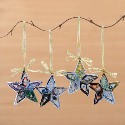 Recycled paper ornaments, 'Dangling Starlight' (set of 4) - Artisan Crafted Recycled Magazine Ornaments Set of 4