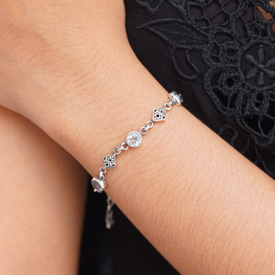 Blue topaz link bracelet, 'Sky Serenade' - Blue Topaz and Sterling Silver Link Bracelet from Bali
