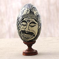 Wood sculpture, 'Bali Masks' - Egg-Shaped Cultural Albesia Wood Sculpture from Bali