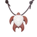 Bone and wood pendant necklace, 'Bali Turtle' - Sawo Wood and Bone Turtle Necklace from Bali