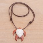 Bone and wood pendant necklace, 'Bali Turtle' - Sawo Wood and Bone Turtle Necklace from Bali