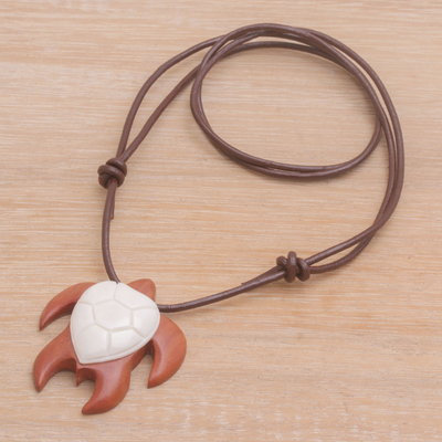 Bone and wood pendant necklace, 'Bali Turtle' - Sawo Wood and Bone Turtle Necklace from Bali