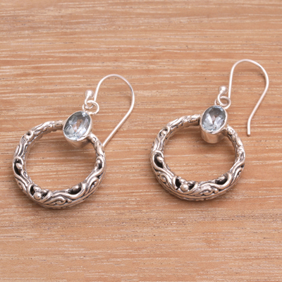 Blue topaz dangle earrings, 'Echo Ring' - Blue Topaz and Sterling Silver Dangle Earrings from Bali