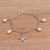 Cultured freshwater pearl charm bracelet, 'Sea Star' - Cultured Freshwater Pearl and Silver Starfish Charm Bracelet thumbail