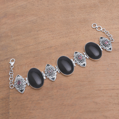 Onyx and garnet link bracelet, 'Enchanting Beauty' - Onyx and Garnet Sterling Silver Link Bracelet from Bali