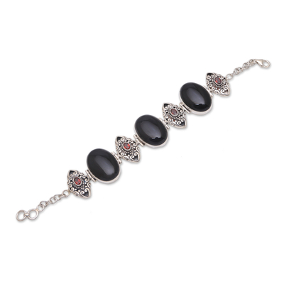 Onyx and garnet link bracelet, 'Enchanting Beauty' - Onyx and Garnet Sterling Silver Link Bracelet from Bali
