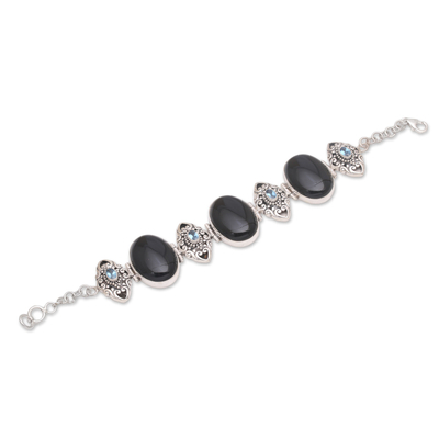 Onyx and blue topaz link bracelet, 'Enchanting Grace' - Onyx and Blue Topaz Sterling Silver Link Bracelet from Bali