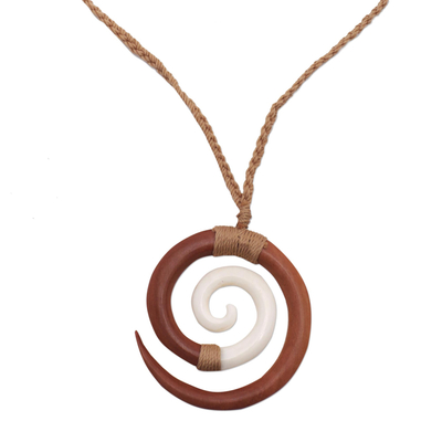 Wood and bone pendant necklace, 'Hypnotic Borneo' - Sawo Wood and Cow Bone Adjustable Pendant Necklace