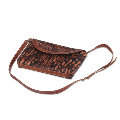 Batik leather sling, 'Parang Bloom' - Adjustable Dark Brown Leather Floral Parang Sling