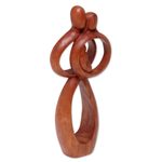Wood sculpture, 'Infant Love' - Hand-Carved Suar Wood Parents and Newborn Family Sculpture