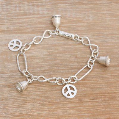 Sterling silver charm bracelet, 'Peaceful Infinity' - Sterling Silver Peace Symbol Charm Bracelet from Bali