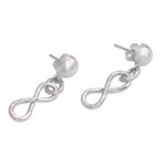 Sterling silver dangle earrings, 'Glistening Infinity' - Sterling Silver Infinity Symbol Dangle Earrings from Bali