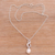 Cultured pearl pendant necklace, 'Infinity Glow' - Infinity Symbol Cultured Pearl Necklace from Bali