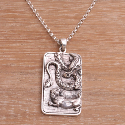 Sterling silver pendant necklace, 'Mythical Battle' - Sterling Silver Dragon and Lion Battle Pendant Necklace