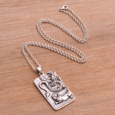 Sterling silver pendant necklace, 'Mythical Battle' - Sterling Silver Dragon and Lion Battle Pendant Necklace