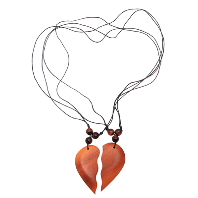 Wood pendant necklaces, 'Shared Heart' (Pair) - Matching Heart Halves Wood Pendant Necklaces (Pair)