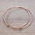 Rose gold plated sterling silver bangle bracelets, 'Knotted Gold' (pair) - Pair of Rose Gold Plated Sterling Silver Bangle Bracelets